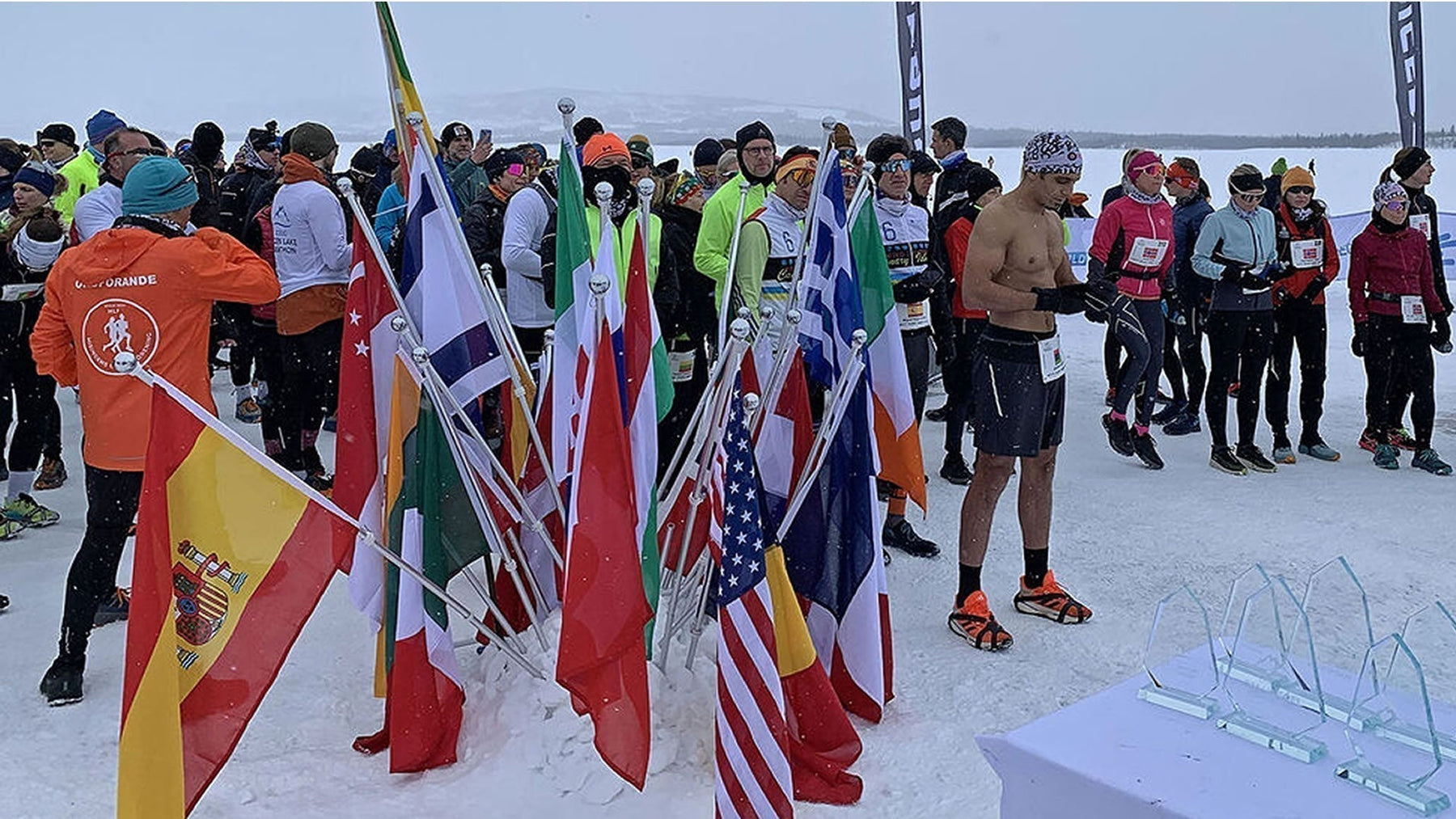 Runners competing in the Icebug Frozen Lake Marathon on frozen Tisleifjorden, Norway