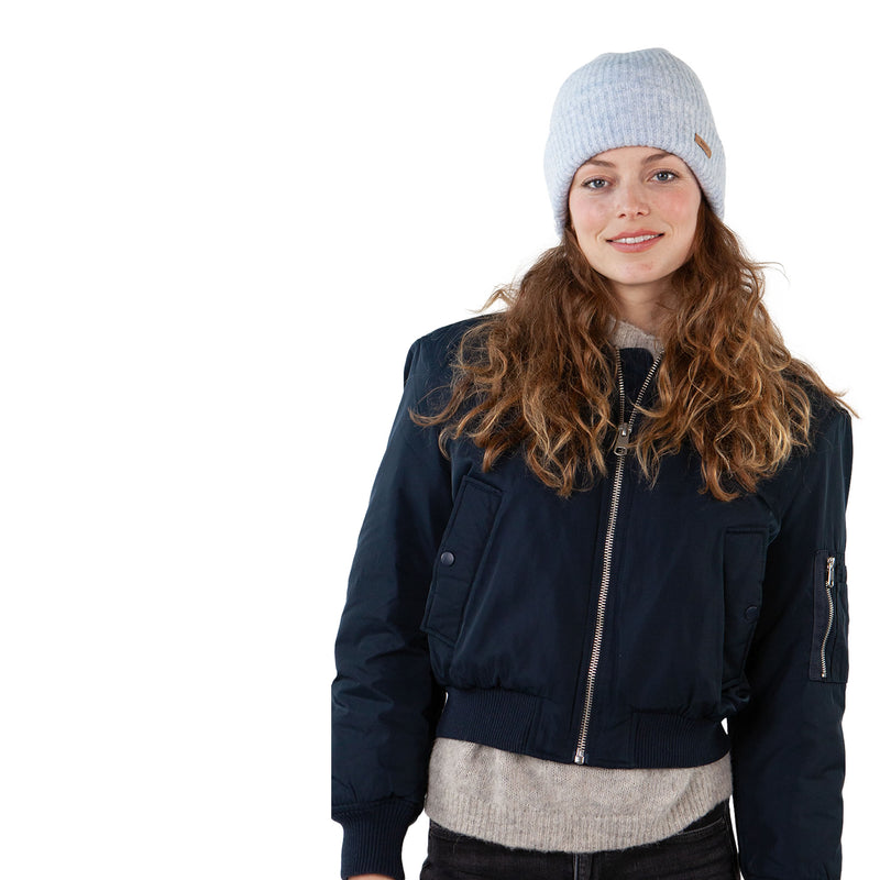 Crafted with a super-soft, stretchy knit, Witzia Beanie in Light Blue wraps you in cozy comfort—ideal for damp winters and frosty months. Whether you're curling up by the fire, walking the dog, navigating snowy streets, or dancing on the tables at an apres ski session, this chic beanie keeps you both stylish and warm. Team with Witzia Gloves and Scarf for total Winter comfort. Buy now at ICEGRIPPER.