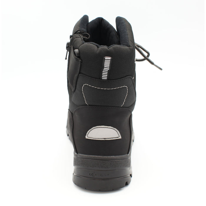 The Keele Men's winter boot, black, designed to tackle everything the season throws at you. Cold, wet, or icy conditions are no match for its rugged build, with a 100% waterproof matt PU and nylon upper and the patented OC anti slip system built into the sole. Buy now at ICEGRIPPER.