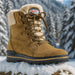 Olang Meribel BTX OC Women Winter Thermal Snow Boots with OC Ice Grip System, Tan. Shown in a snowy, mountainous environment - typical of where it might be worn. Buy now at ICEGRIPPER.