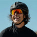 Person wearing a black helmet and reflective sunglasses against a clear blue sky. The Magma Campeone is built around Knockaround’s innovative Knockterra performance lens technology, Campeone sunglasses deliver crystal-clear vision, UV400 protection, and impact-resistant durability. Their sleek wraparound design guards against low winter sun and glare reflected from snow and ice, while rubberized adjustable nose grips and flexible non-slip arms ensure a secure, all-day fit.
