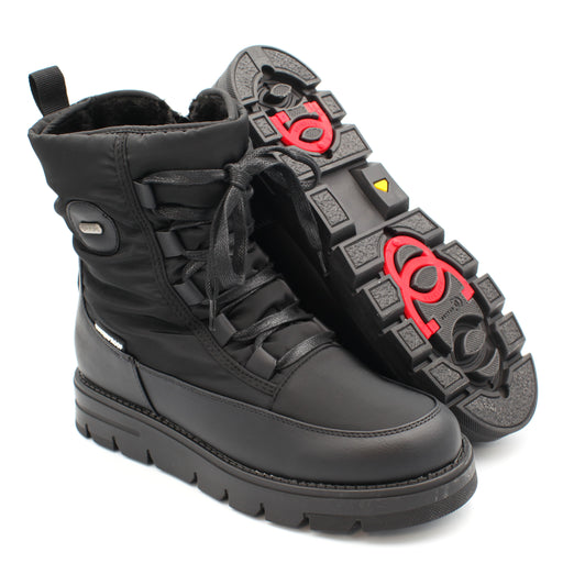 The Taylor, Black, is a Women's waterproof winter boot with ice grip OC System soles. It features a side zip for easy entry and front laces for personalised fit. Buy now at ICEGRIPPER.