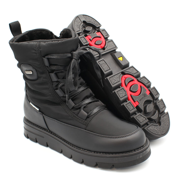 The Taylor, Black, is a Women's waterproof winter boot with ice grip OC System soles. It features a side zip for easy entry and front laces for personalised fit. Buy now at ICEGRIPPER.