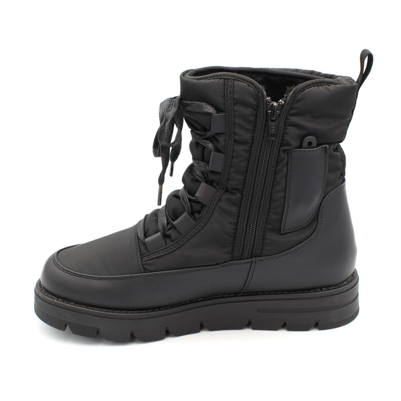 The Taylor, Black, is a Women's waterproof winter boot with ice grip OC System soles. It features a side zip for easy entry and front laces for personalised fit. Buy now at ICEGRIPPER.