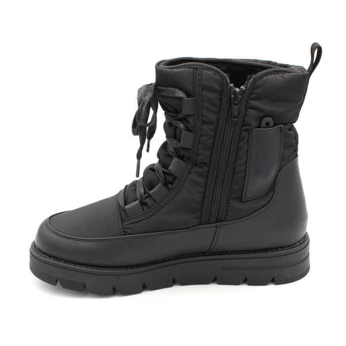 The Taylor, Black, is a Women's waterproof winter boot with ice grip OC System soles. It features a side zip for easy entry and front laces for personalised fit. Buy now at ICEGRIPPER.