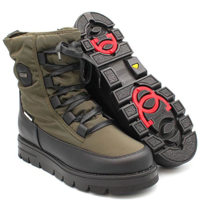 This version of the Taylor in Olive, features our signature OC System retractable ice grips built into the sole. Flip them out when it's slippery, tuck them away when it’s not – perfect for switching from snowy pavements to frosty country walks without missing a beat. Buy now at ICEGRIPPER.