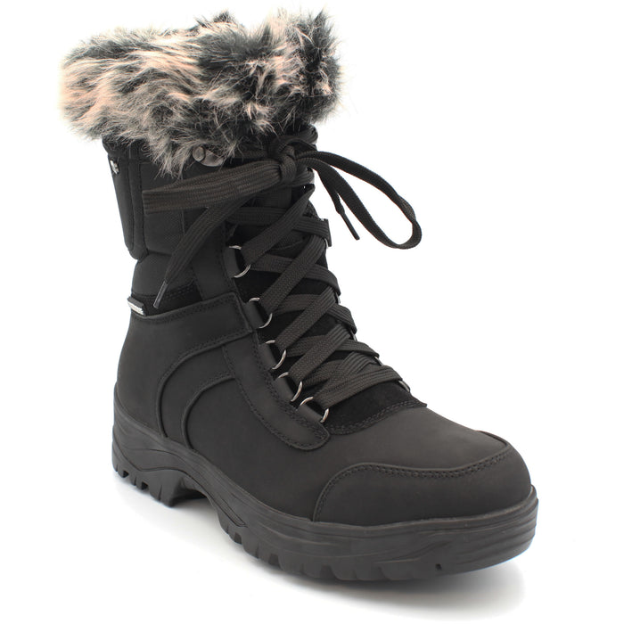 The Yukon Women's Winter Boot in Black, features faux fur trim for extra warmth and winter flair, a removable felt insole for all-day comfort, YKK side zipper with gusset and lace-up front for easy wear and a snug fit, and comes with an extra pair of black laces to switch up your look. It also features the incredible on/off ice grip anti slio OC System soles. Buy now at ICEGRIPPER.