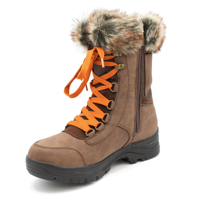 The Yukon Women's Winter Boot in Brown, features faux fur trim for extra warmth and winter flair, a removable felt insole for all-day comfort, YKK side zipper with gusset and lace-up front for easy wear and a snug fit, and comes with an extra pair of brown laces to switch up your look. It also features the incredible on/off ice grip anti slio OC System soles. Buy now at ICEGRIPPER.