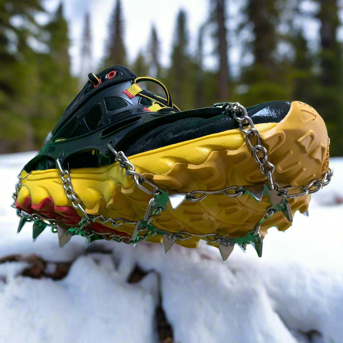 ICEGRIPPER ACTIVspikes in the snow, shown here on a trail shoe. Buy now at ICEGRIPPER.