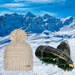 Beige Jasmin Barts Beanie, paired with ICEGRIPPER ACTIVspikes, as a special 'bundle' offer for the 2026 Milano-Cortina Winter Olympics. Both products superimposed over a snowy ski slope background.