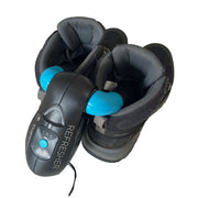 Therm.ic Boot Refresher Antibacterial Dryer for Boots, Shoes and Gloves. Shown inserted into a pair of walking boots. Demonstrating how it would work in practice to dry damp boots. Buy now at ICEGRIPPER.