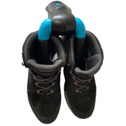 Therm.ic Boot Refresher Antibacterial Dryer for Boots, Shoes and Gloves. Shown inserted into a pair of walking boots. Demonstrating how it would work in practice to dry damp boots. Buy now at ICEGRIPPER.