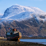 The Corpach Shipwreck, also known as the Old Boat of Caol, located near Fort William, Scotland. It sits on the shore of Loch Linnhe. ICEGRIPPER Guide Book 'Walking Ben Nevis and Glen Coe' will help you plan your walks and adventures in the area.