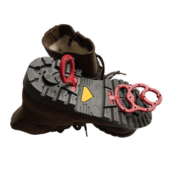 Pair of Olang Charro Tan boots. Demonstrating the unique on and off OC System ice grip sole.