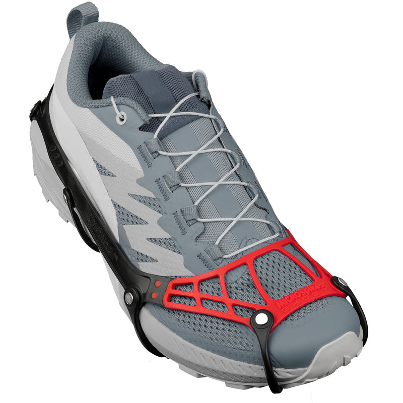 Top view of the new Kahtoola Microspikes Ghost Footwear Traction on a trail shoe. The TPU and TPE construction can be seen. This unique mixture and design is partly responsible for the featherlight weight.