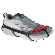 Side view of the new Kahtoola Microspikes Ghost Footwear Traction on a trail shoe. The TPU and TPE construction can be seen. This unique mixture and design is partly responsible for the featherlight weight.