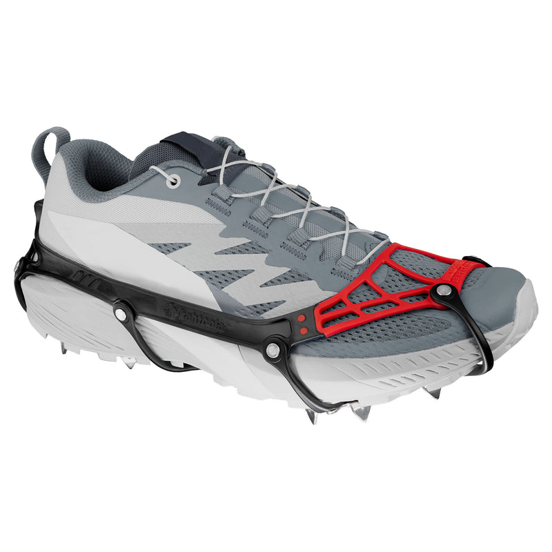 Side view of the new Kahtoola Microspikes Ghost Footwear Traction on a trail shoe. The TPU and TPE construction can be seen. This unique mixture and design is partly responsible for the featherlight weight.