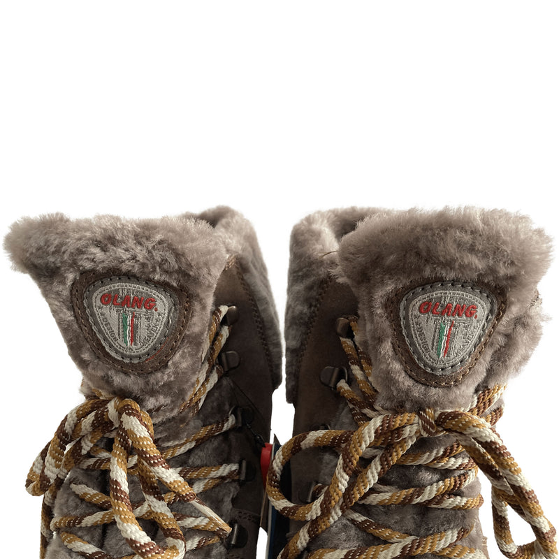 Olang Ginevra OC, Coffee, brings together luxurious Italian design and serious winter functionality. This modern ankle boot redefines cold-weather comfort with the perfect balance of style and warmth. With on/off ice grip soles for safe walking on icy and snowy surfaces. Buy now at ICEGRIPPER.