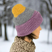 Keep your head warm, while looking cool. JailJam Sidhue Beanie Grapes for your winter woodland walks. Buy now at ICEGRIPPER