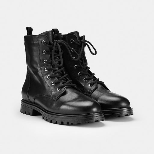 Pair of Ilves Särna Black women's leather lace-up winter boots with OCSystem ice grips.