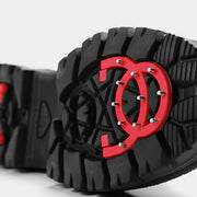 OCSystem forefoot grip deployed, showing the metal traction studs.