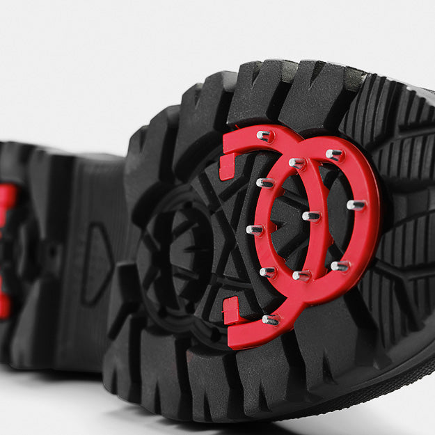 OCSystem forefoot grip deployed, showing the metal traction studs.