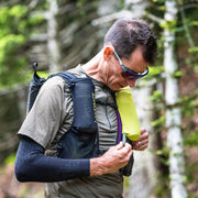 Trail runner wearing Instinct Arm Sleeves