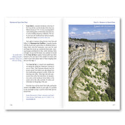 Switzerland's Jura Crest Trail Guide Book. Showing details of Stage 9 Noiraigue to Sainte-Croix. Showing photos of the of the Creux de Van, a natural rock amphitheatre.