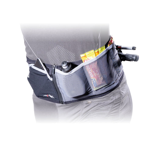 The Nortec Trail Sensitive Trail Belt is the ultimate companion for serious runners tackling marathon distances and endurance trail challenges. Designed for performance, this ultra-stretch, body-hugging running belt offers a secure, bounce-free fit with 4.5 L of smart storage for gels, soft flasks, phone, and layers. Its water-repellent pockets and reflective detailing make it perfect for long runs, mountain terrain, and night training. Buy now at ICEGRIPPER.