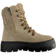 A beige suede lace-up ankle boot with a black lug sole, brown and gold laces, and a plush shearling-style lining visible at the collar and side. Olang Praga TEX OC Clay – Women's Winter Ice Grip Boots.