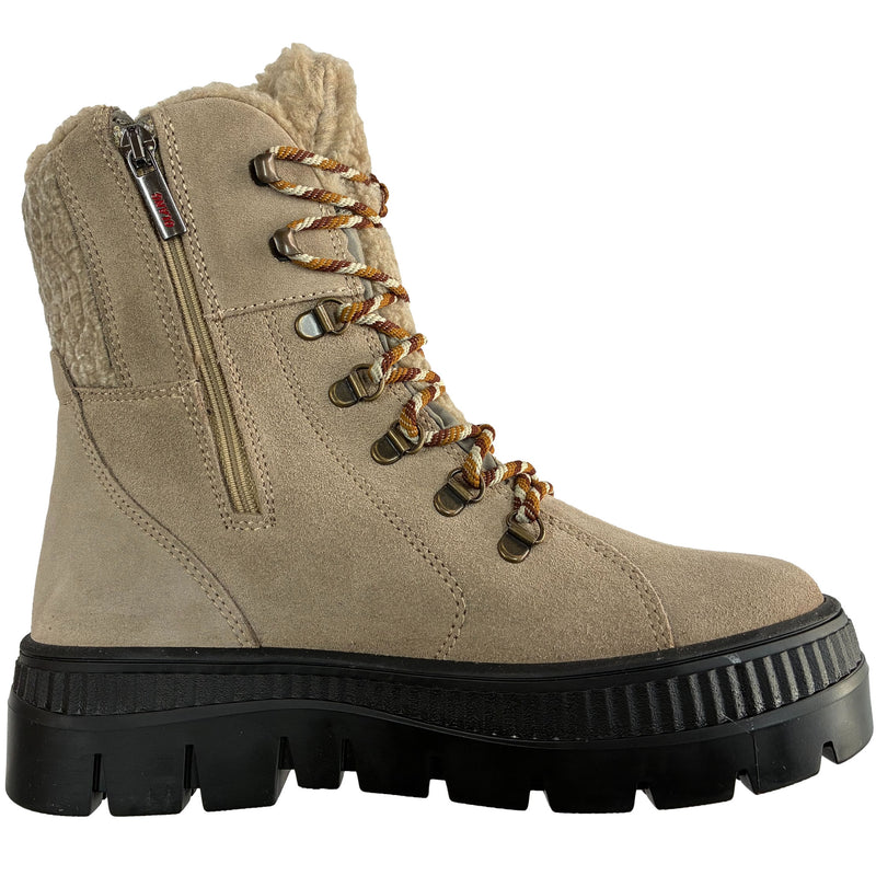 A beige suede lace-up ankle boot with a black lug sole, brown and gold laces, and a plush shearling-style lining visible at the collar and side. Olang Praga TEX OC Clay – Women's Winter Ice Grip Boots.