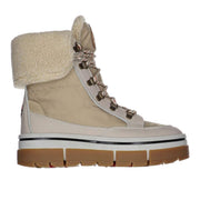 Pajar Henta OC Womens Winter Boot in Sand is an 8-inch lace-up boot featuring a fold-over sherpa collar and a vegan nubuck leather upper, combining rugged durability with a soft, stylish look. The Henta OC is fully waterproof and seam-sealed, so slush, snow, and sleet stay outside where they belong. Each boot is pre-treated to resist water and stains, helping them stay fresh and looking great season after season. Available now at ICEGRIPPER.
