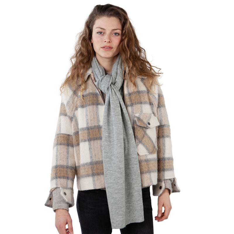 Barts Witzia Scarf in Heather Grey. An extra-soft, stretchy, winter staple perfect for chilly days. Pair it with our Witzia Beanie and Witzia Gloves for an effortlessly snug winter combo you’ll reach for again and again. Buy now at ICEGRIPPER.