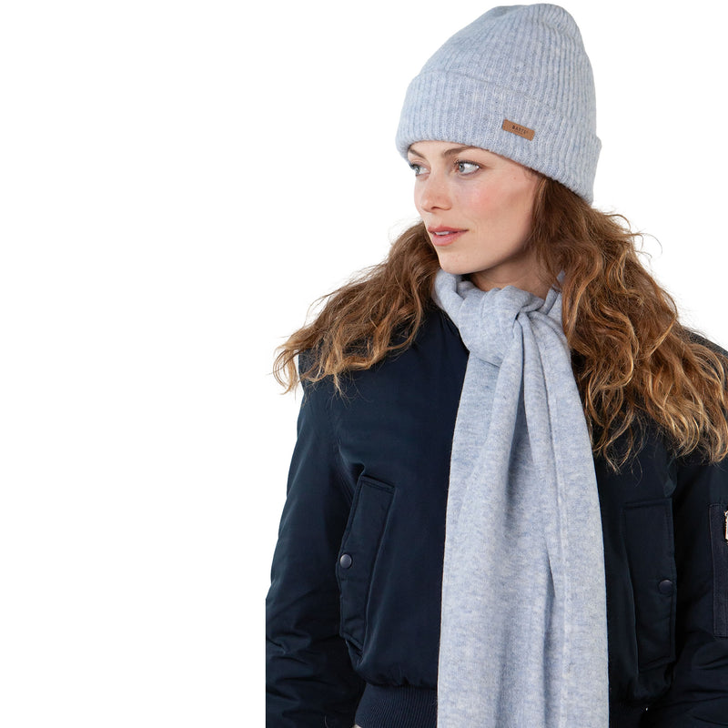 Barts Witzia Scarf in Light Blue. An extra-soft, stretchy, winter staple perfect for chilly days. Pair it with our Witzia Beanie and Witzia Gloves for an effortlessly snug winter combo you’ll reach for again and again. Buy now at ICEGRIPPER.
