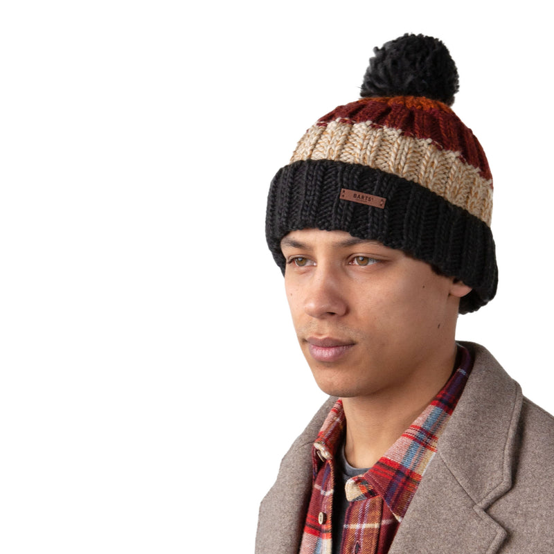 Crafted from high-quality materials, Barts Wilhelm beanie ensures snug insulation and lasting comfort through brisk mornings and chilly evenings. The classic turn up and pom design looks good whether you're heading out for a winter walk, commuting through frosty city streets, or chilling with a vin chaud after a day on the slopes. Buy now at ICEGRIPPER.